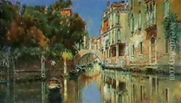 A Sunlit Canal,venice Oil Painting - Antonio Maria de Reyna Manescau