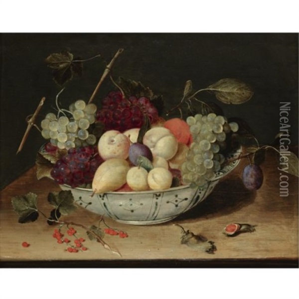 Still Life With Grapes, Peaches, Plums And Other Fruit In A Blue And White Porcelain Bowl, Redcurrants And Hazelnuts Scattered On The Wooden Ledge Below Oil Painting - Jacob van Hulsdonck