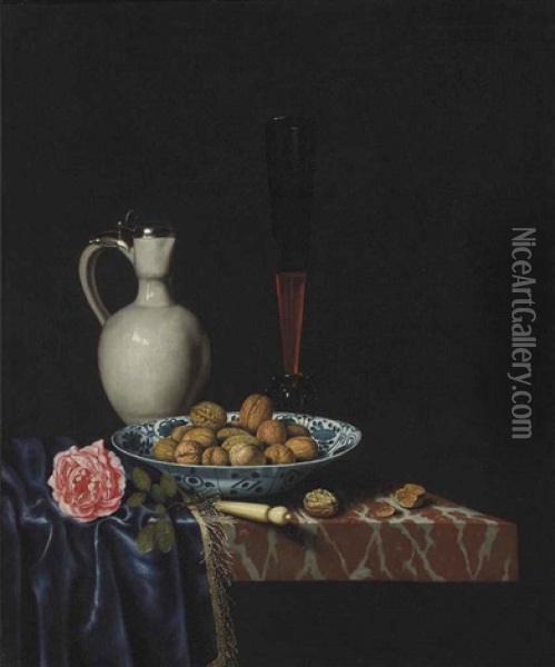 A Wan-li Bowl With Walnuts, A Facon De Venise Wine Glass, An Ivory-handled Knife, A Delft Stoneware Jug And A Rose On A Partially Draped Marble Ledge Oil Painting - Hubert van Ravesteyn