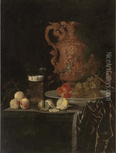 A Gilt Ewer, A Roemer Of Beer, Peaches, A Partly-peeled Lemon On A Pewter Tray, And Grapes And Peaches In A Porcelain Dish On A Partly-draped Table Oil Painting - Georg Hainz